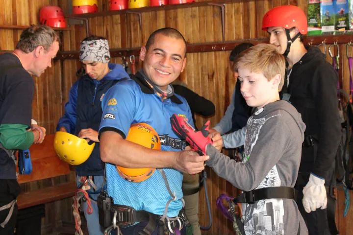 Ziplining instructor and rider